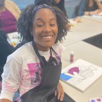 NIARA mentee enjoying the program and painting